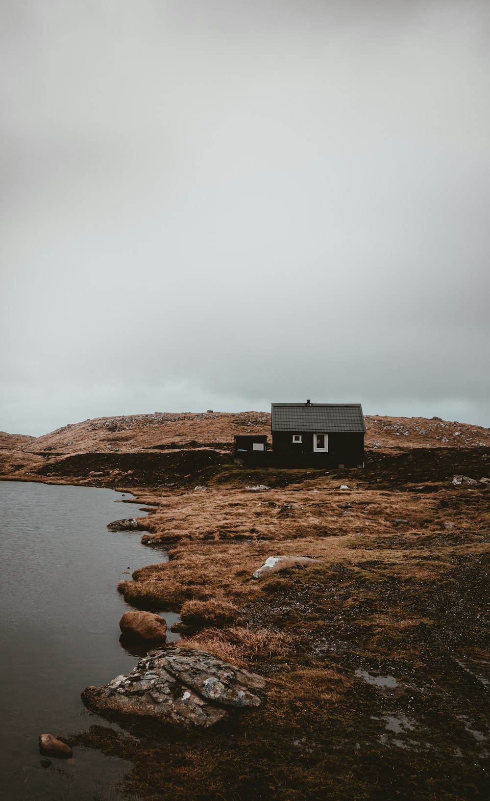 black house in the middle on island