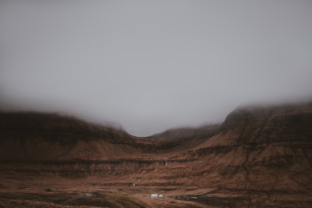 brown canyon with clouds