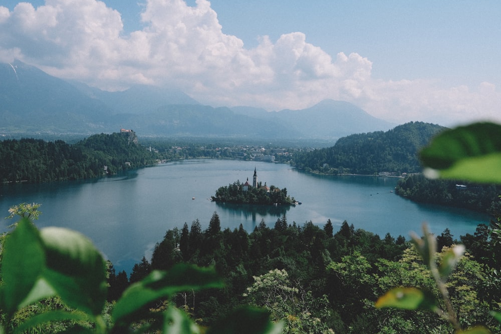 island with cloudy sky during daytime