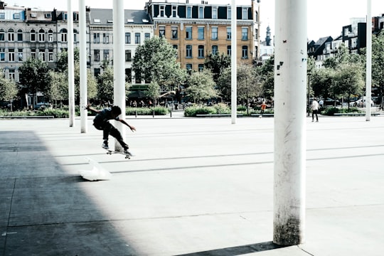 man riding skateboard in Antwerp Belgium