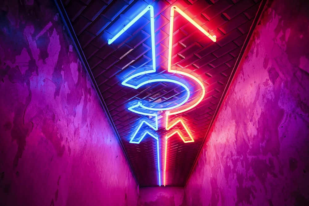 red and blue neon signage