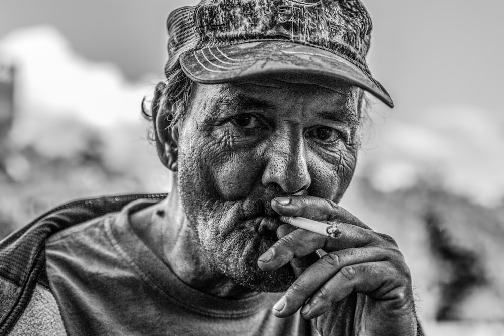 man smoking cigarette