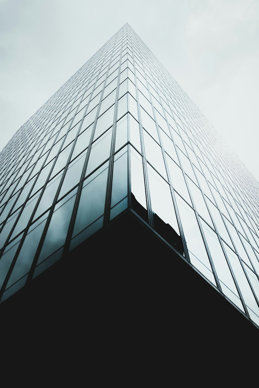 low angle photo of glass architecture wallpaper