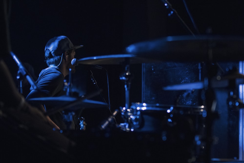 man playing drum