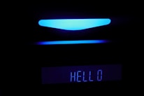 3D avatar of an AI assistant welcoming visitors on a dark premium interface.