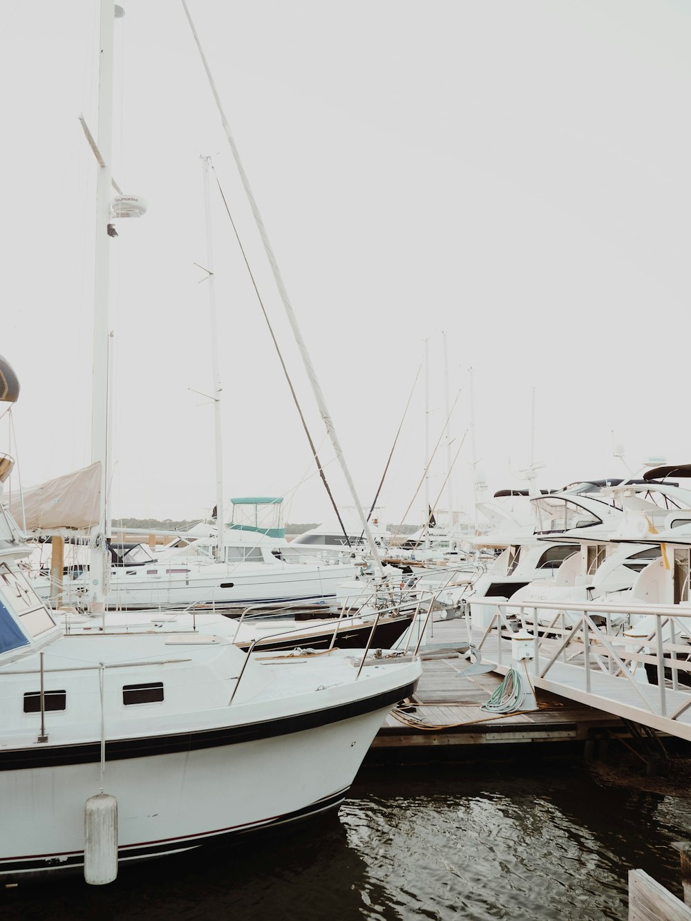 several yachts on docking bay