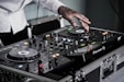 person touching black terminal mixer