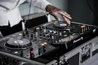 person touching black terminal mixer