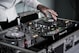 person touching black terminal mixer