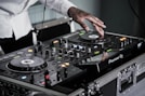 person touching black terminal mixer