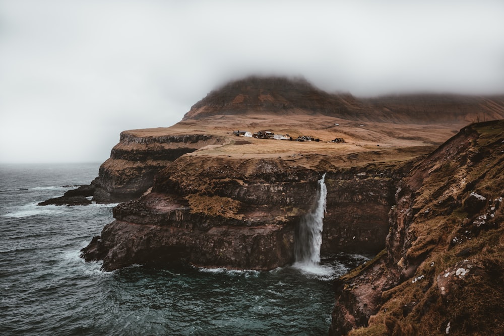 waterfalls rushing in to the water