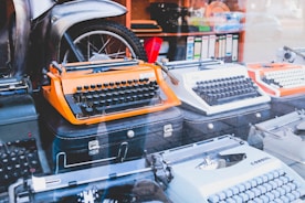 assorted colors of typewriters
