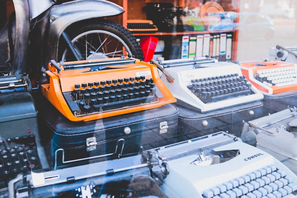 assorted colors of typewriters