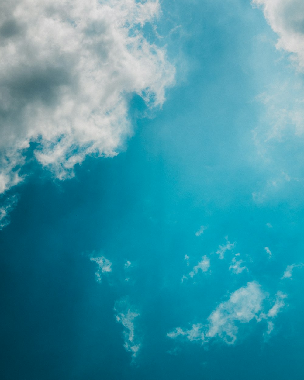 white clouds on a clear sky