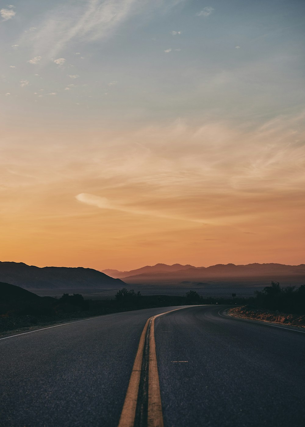 empty gray asphalt road