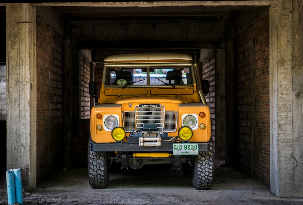 yellow vehicle parked inside building