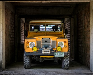 yellow vehicle parked inside building