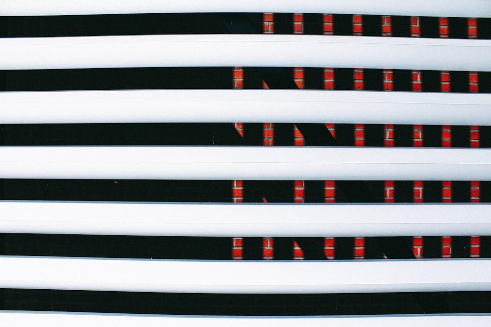 a close up of a number of skis on a white surface