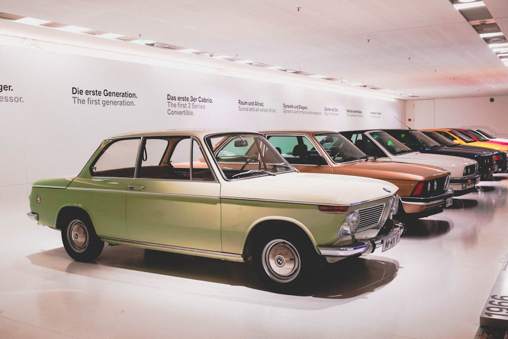 Photo by Anastasia Dulgier white coupe car inside building
