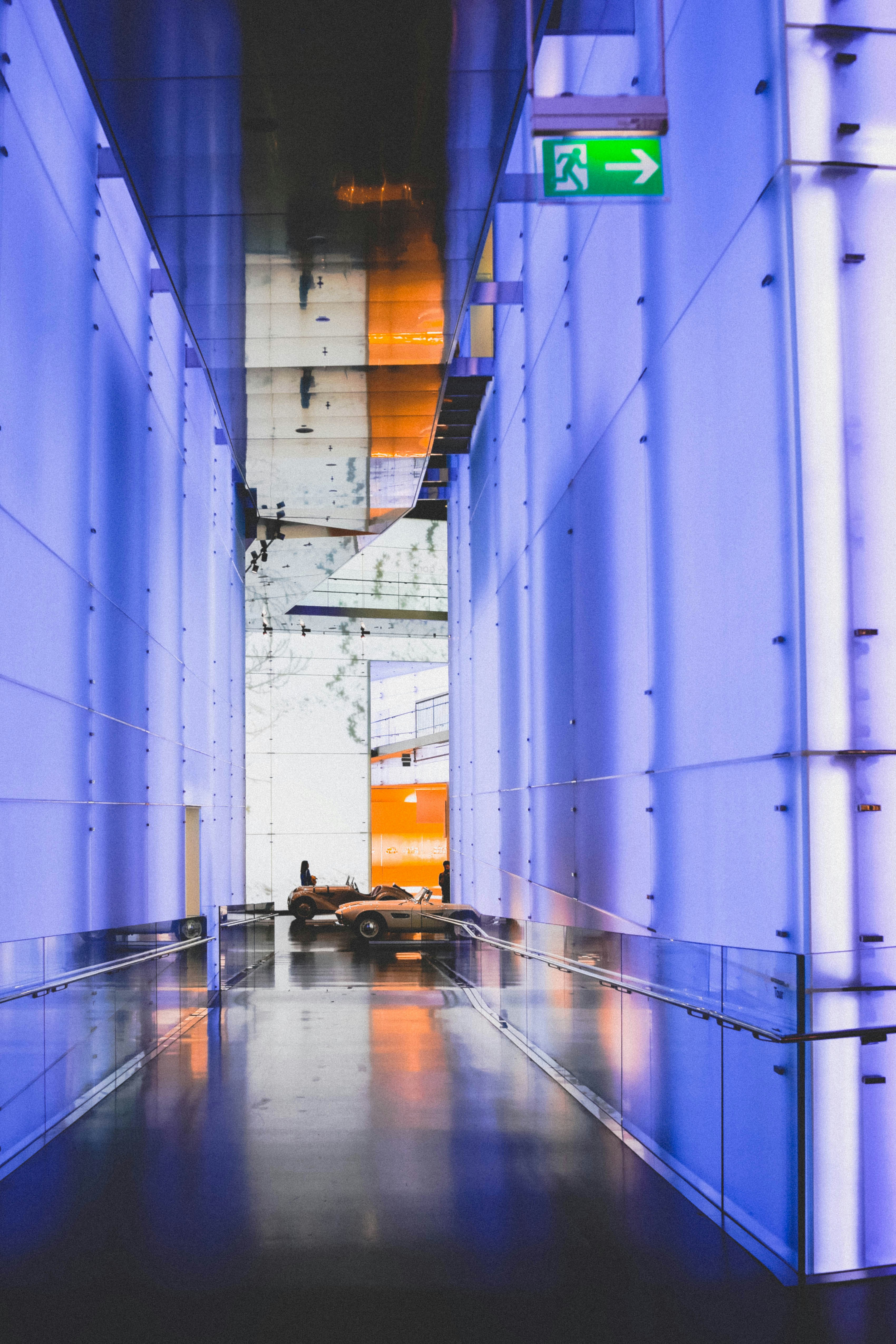 woman wearing yellow long-sleeved dress under white clouds and blue sky during daytime