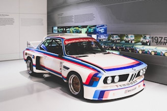 white and red racing car inside room