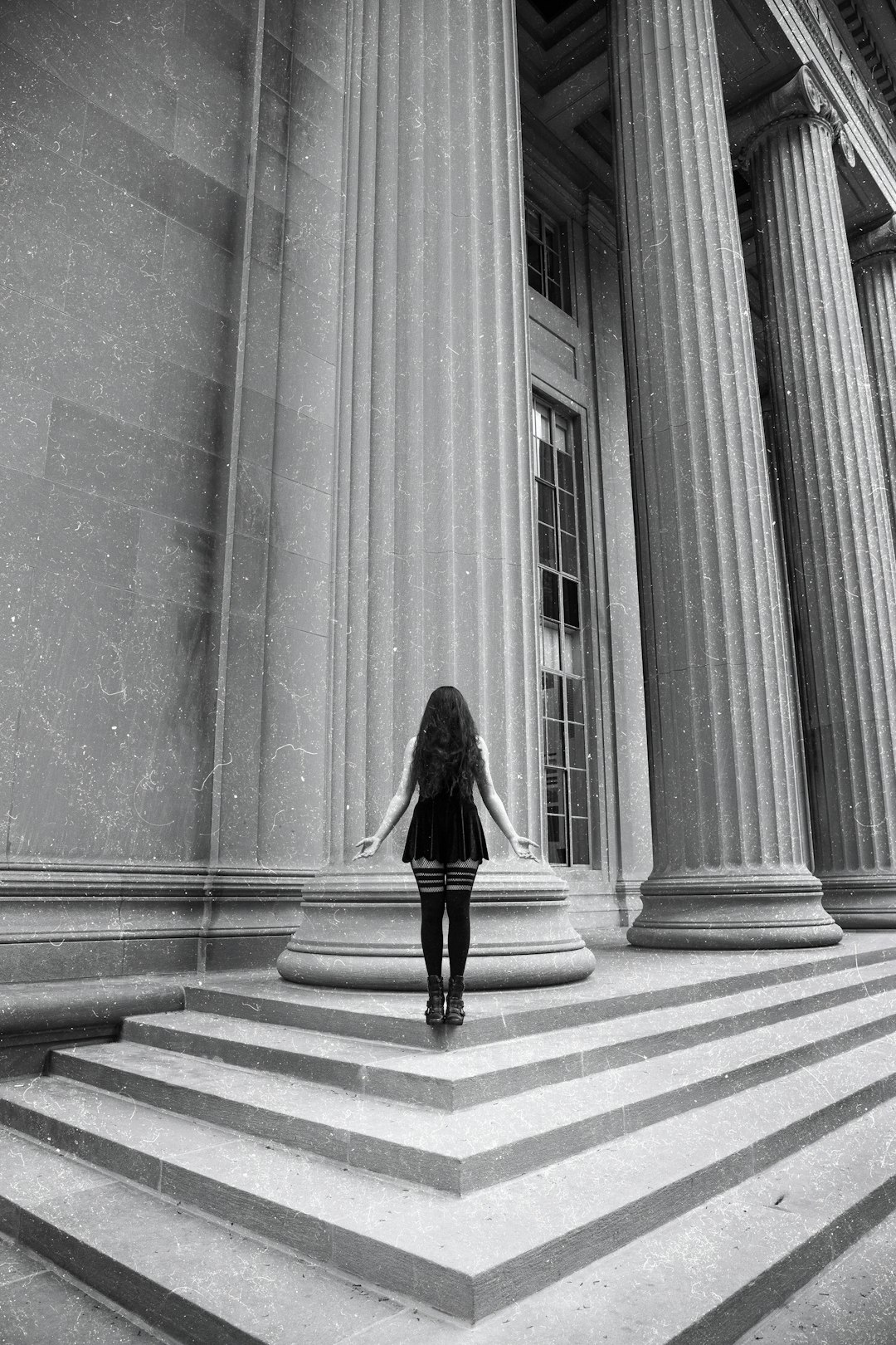 woman standing on stairs