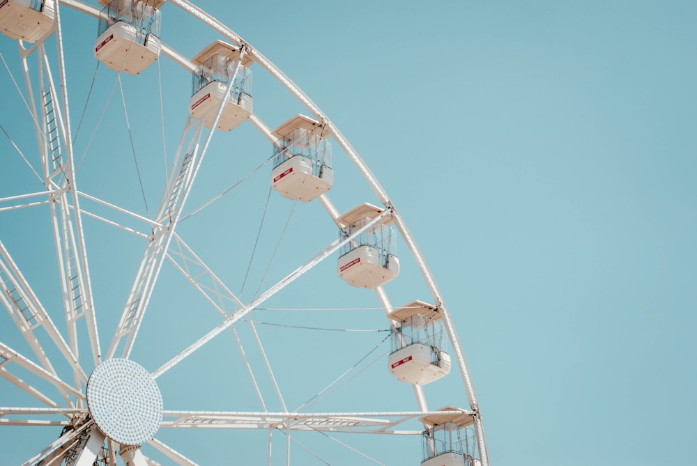 people riding on ferris wheel