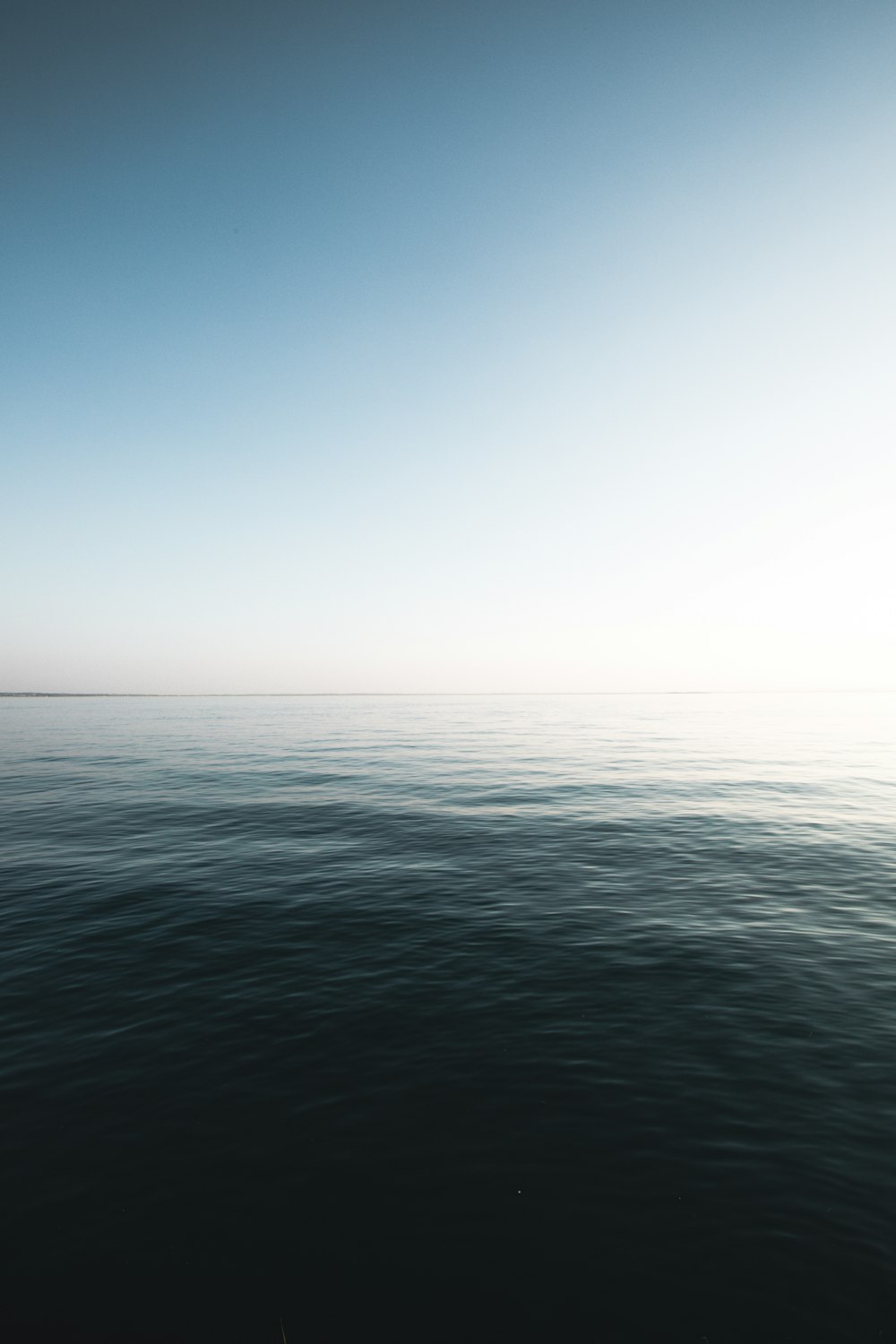 calm body of water at daytime