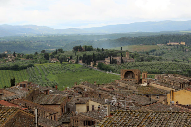 Sunset view over the rolling Tuscan hills with the B&B nestled among olive trees.