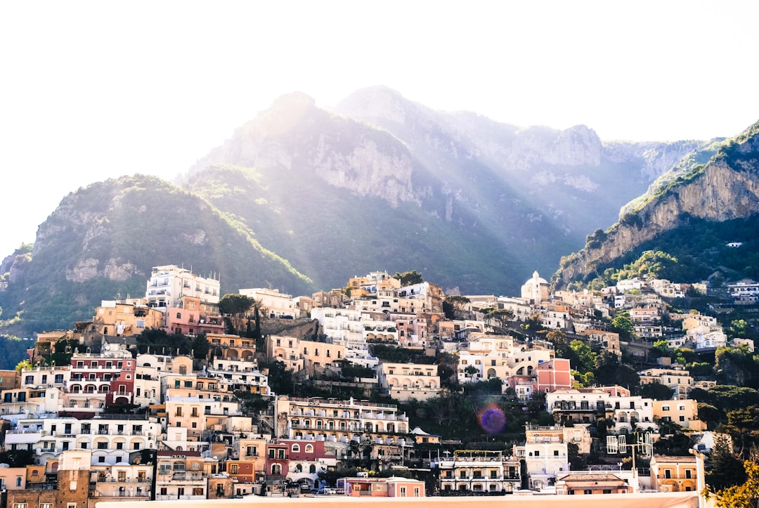 white and brown houses within mountain range during daytime