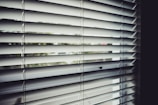 close view of white window blinds