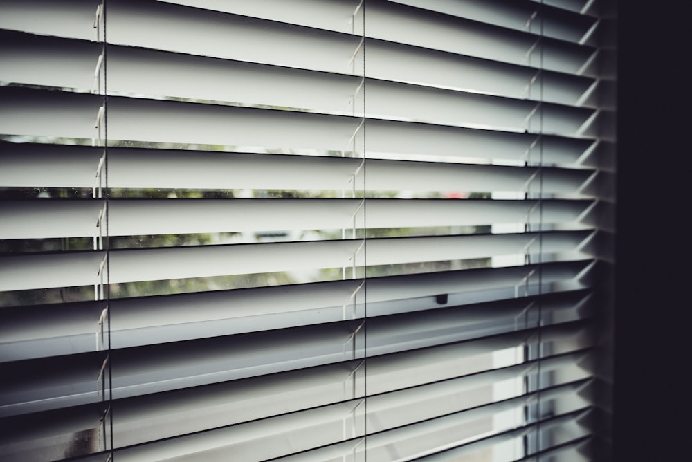 close view of white window blinds