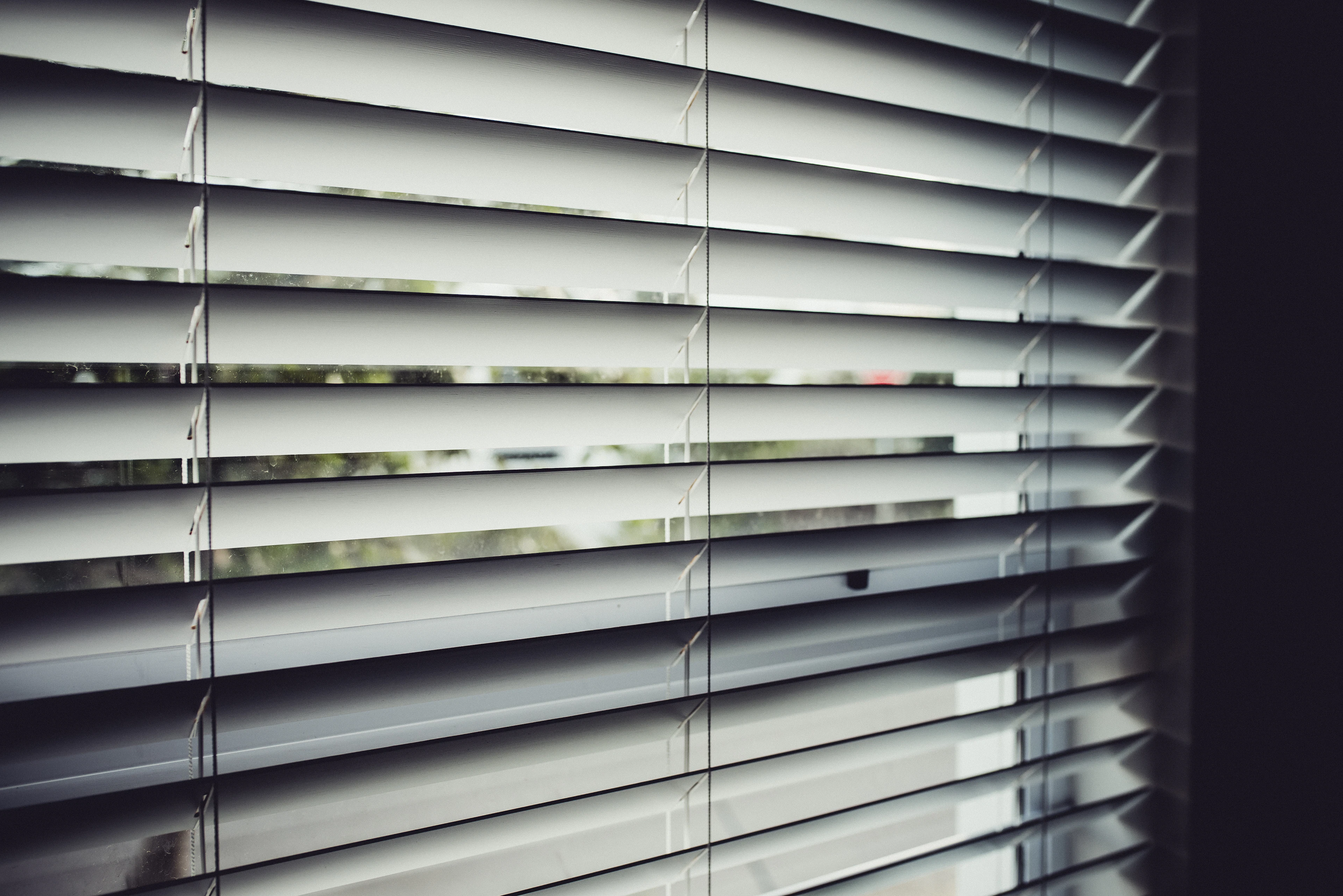 Close view of white window blinds