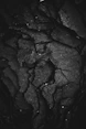 grayscale photography of rock formation