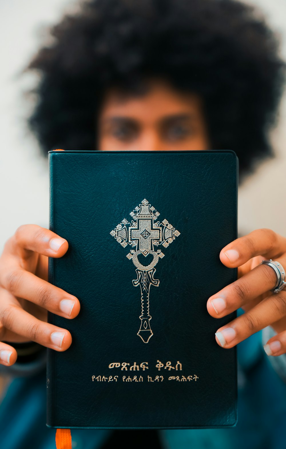 man holding book