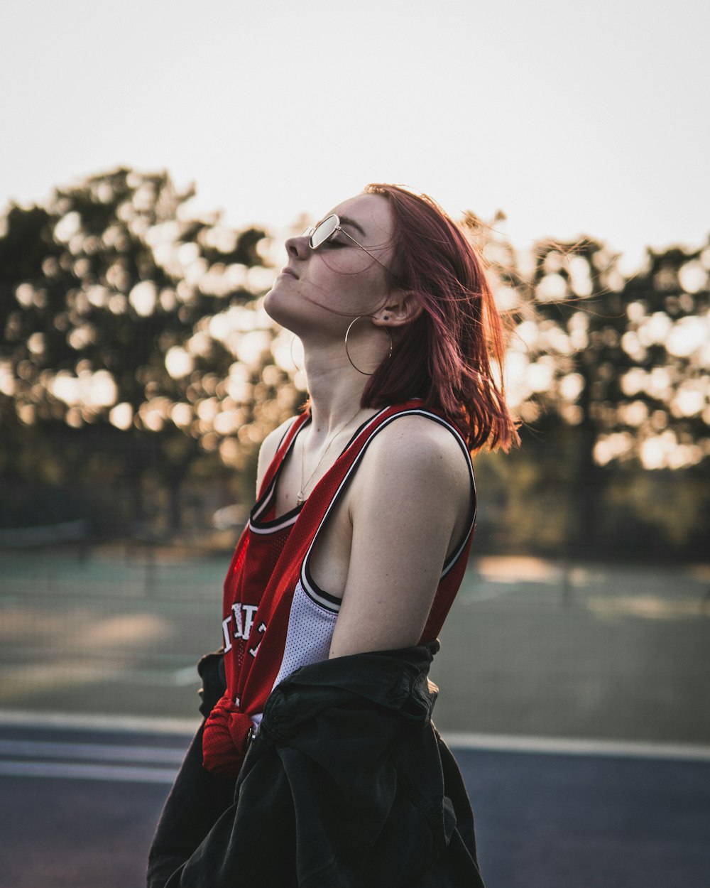 woman looking up outdoors