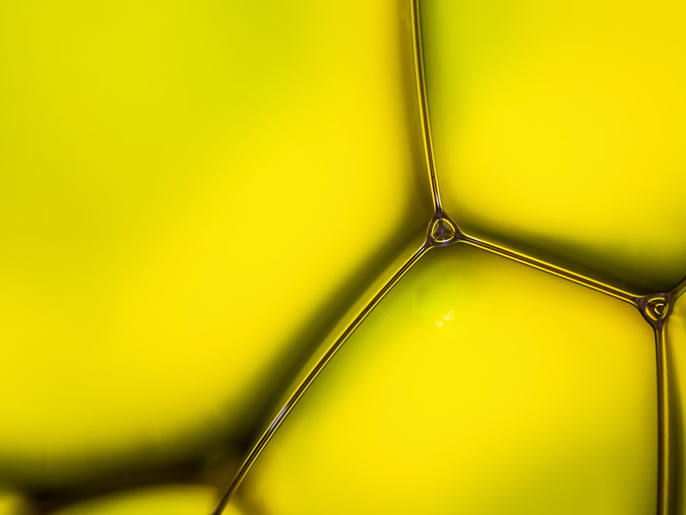 a close up view of a yellow vase