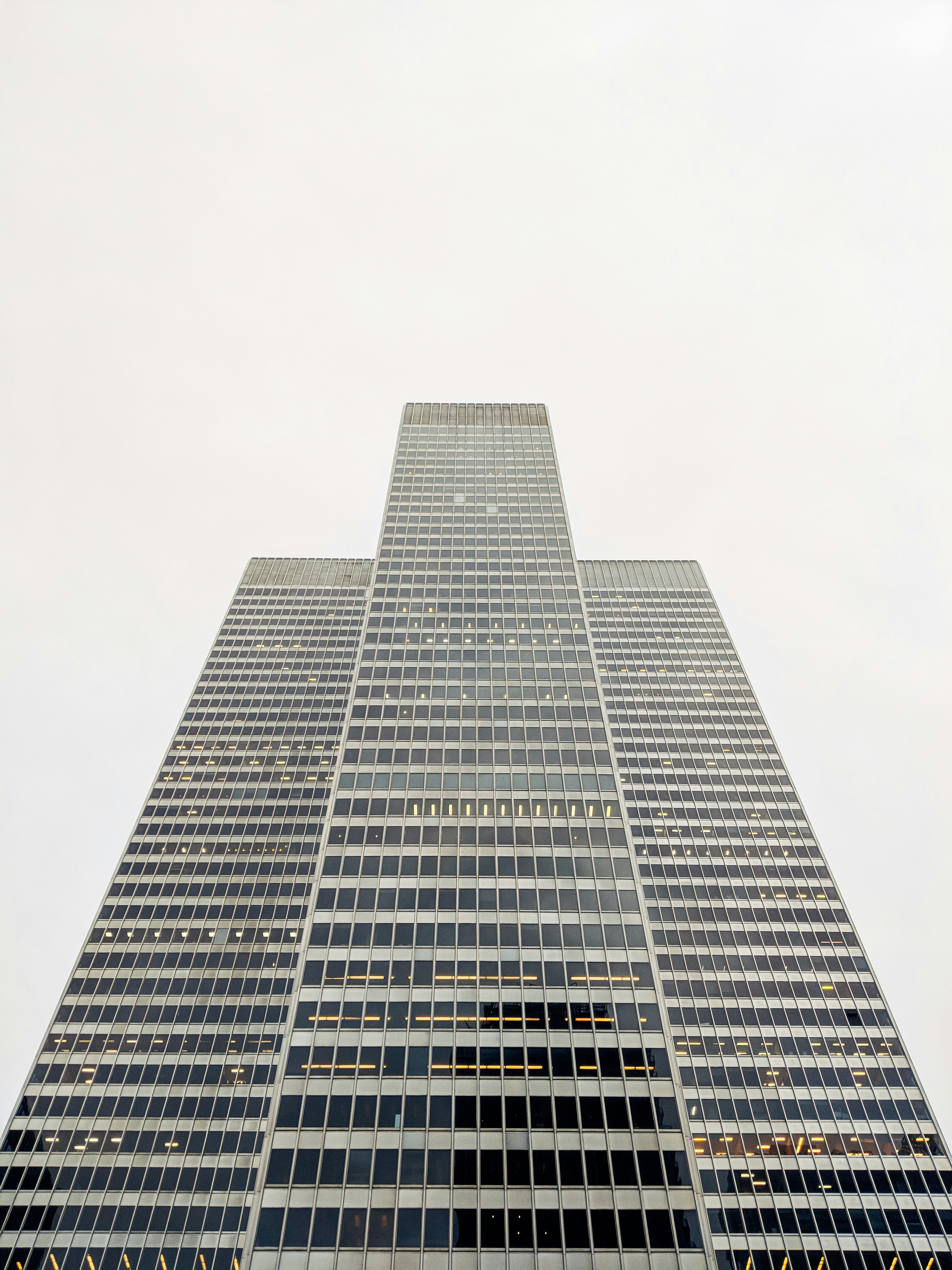 gray tower building on gray sky