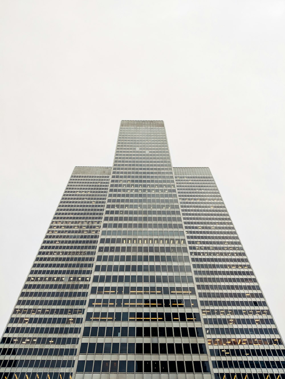 gray tower building on gray sky