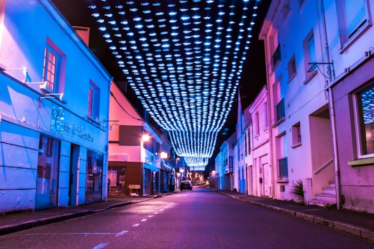 empty alleyway with lighted buntings in Locmiquélic France