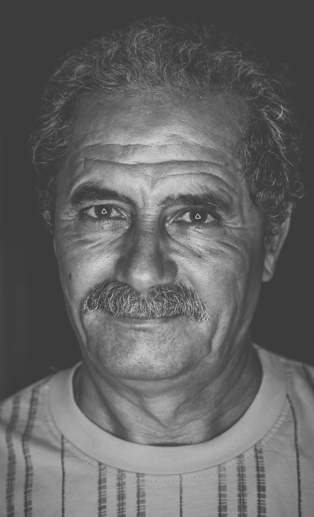 grayscale photo of man in shirt