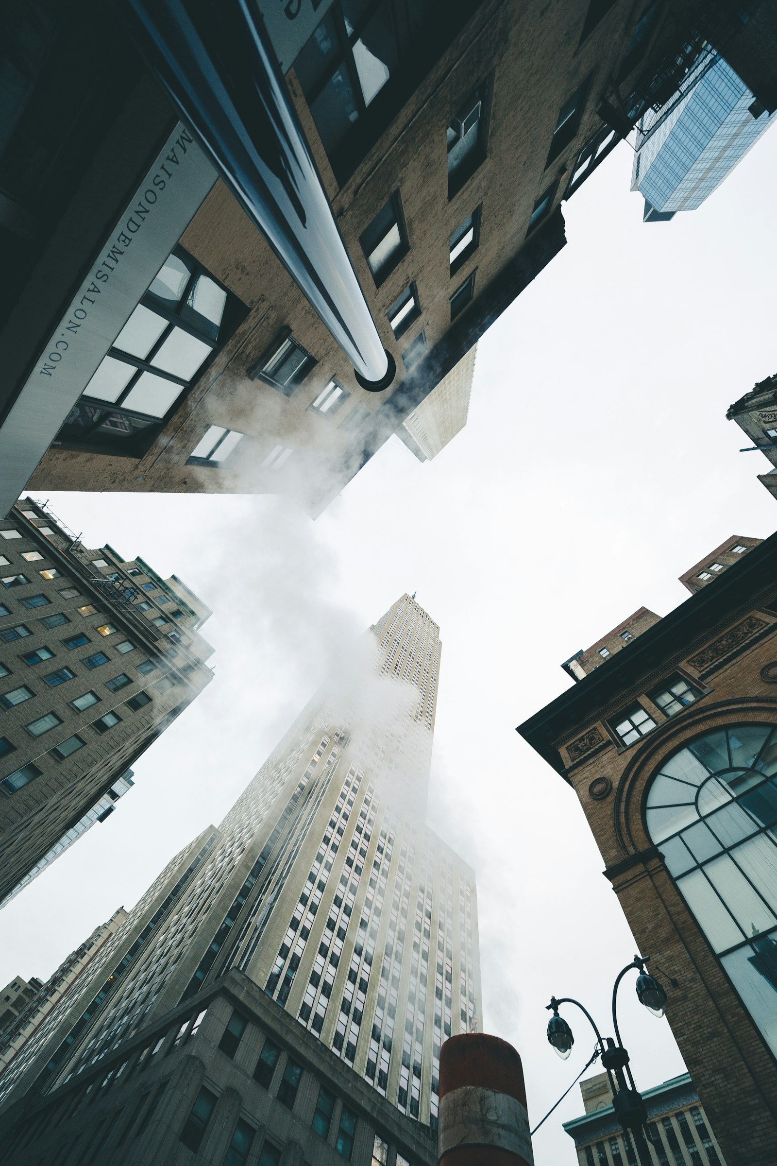 Sony FE 12-24mm F4 G sample photo. Worm's-eye view of buildings photography