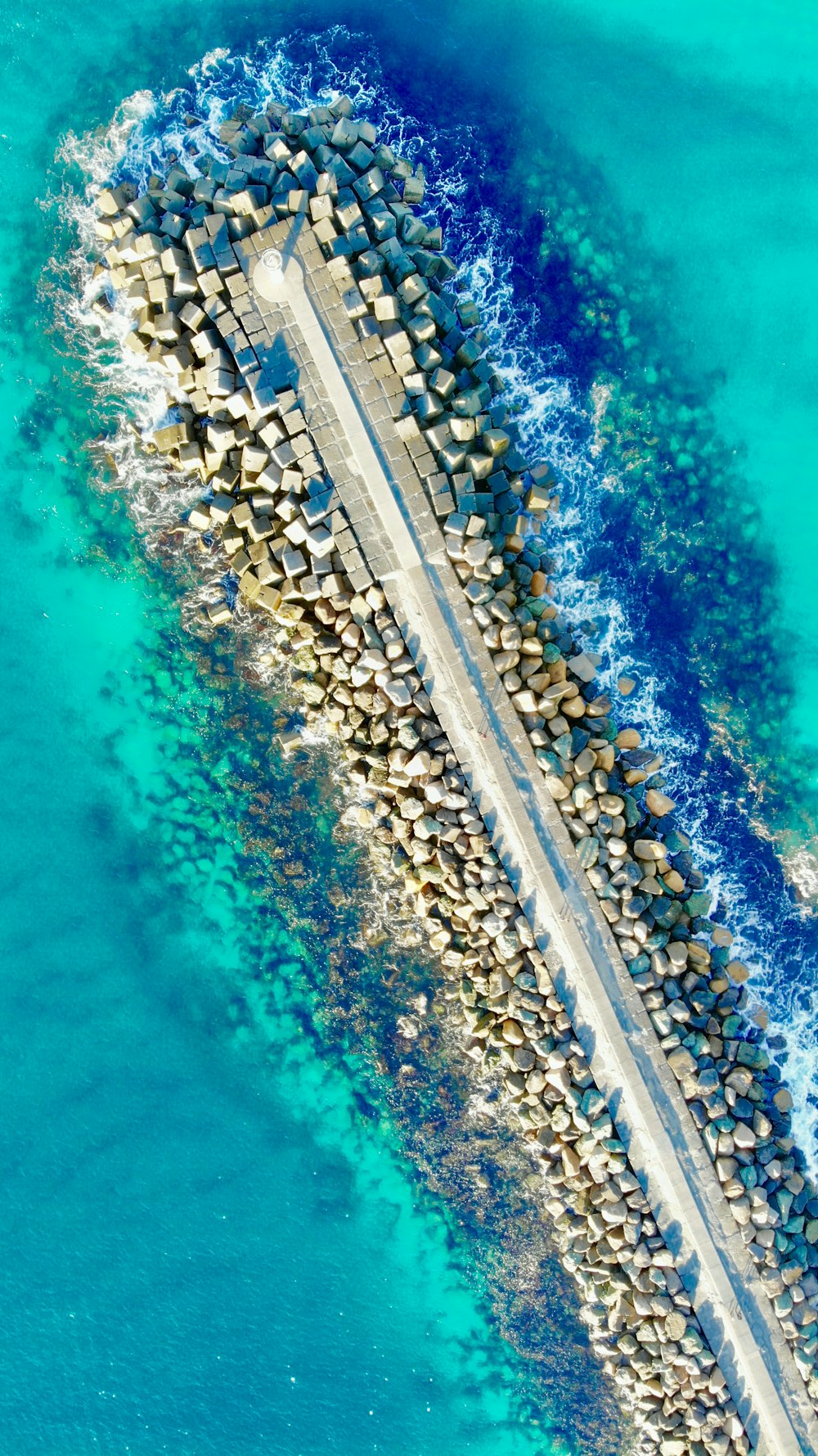 concrete dock surround by water