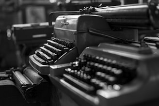 greyscale photo of typewriter