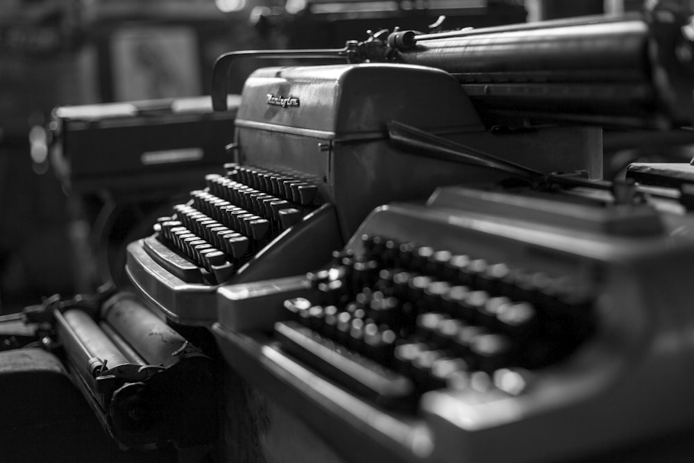 greyscale photo of typewriter