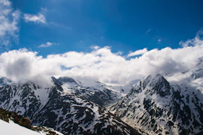 Snow-capped mountains of Kashmir under a clear blue sky