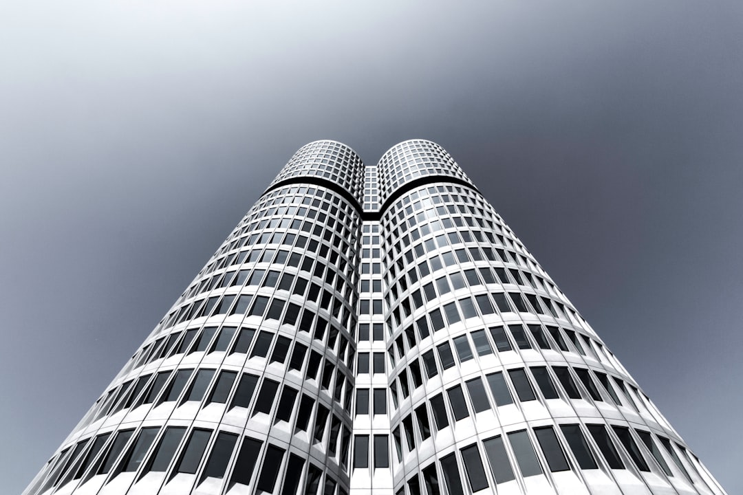 low-angle photography of curtain wall tower building