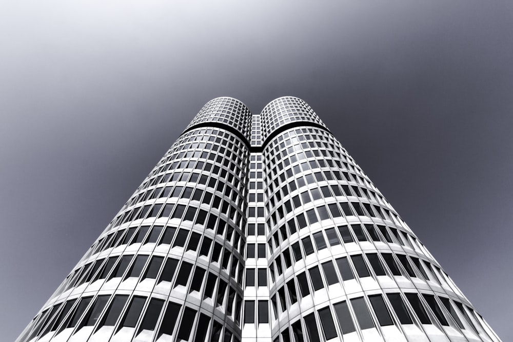 low-angle photography of curtain wall tower building