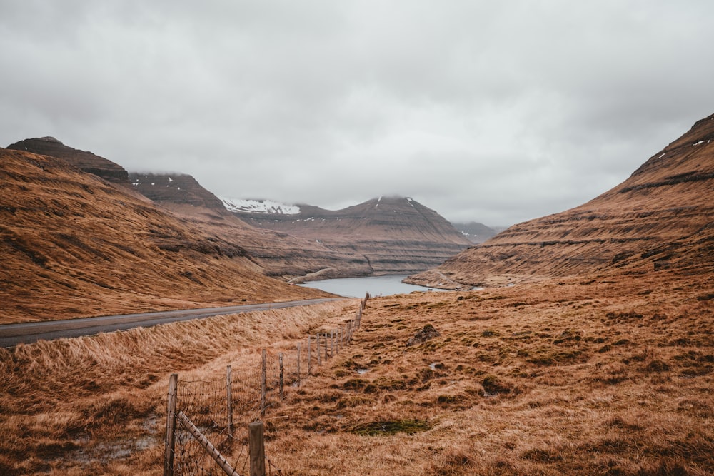 landscape photography of river near the mountains