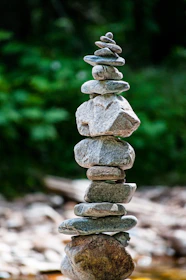 stone balancing in river